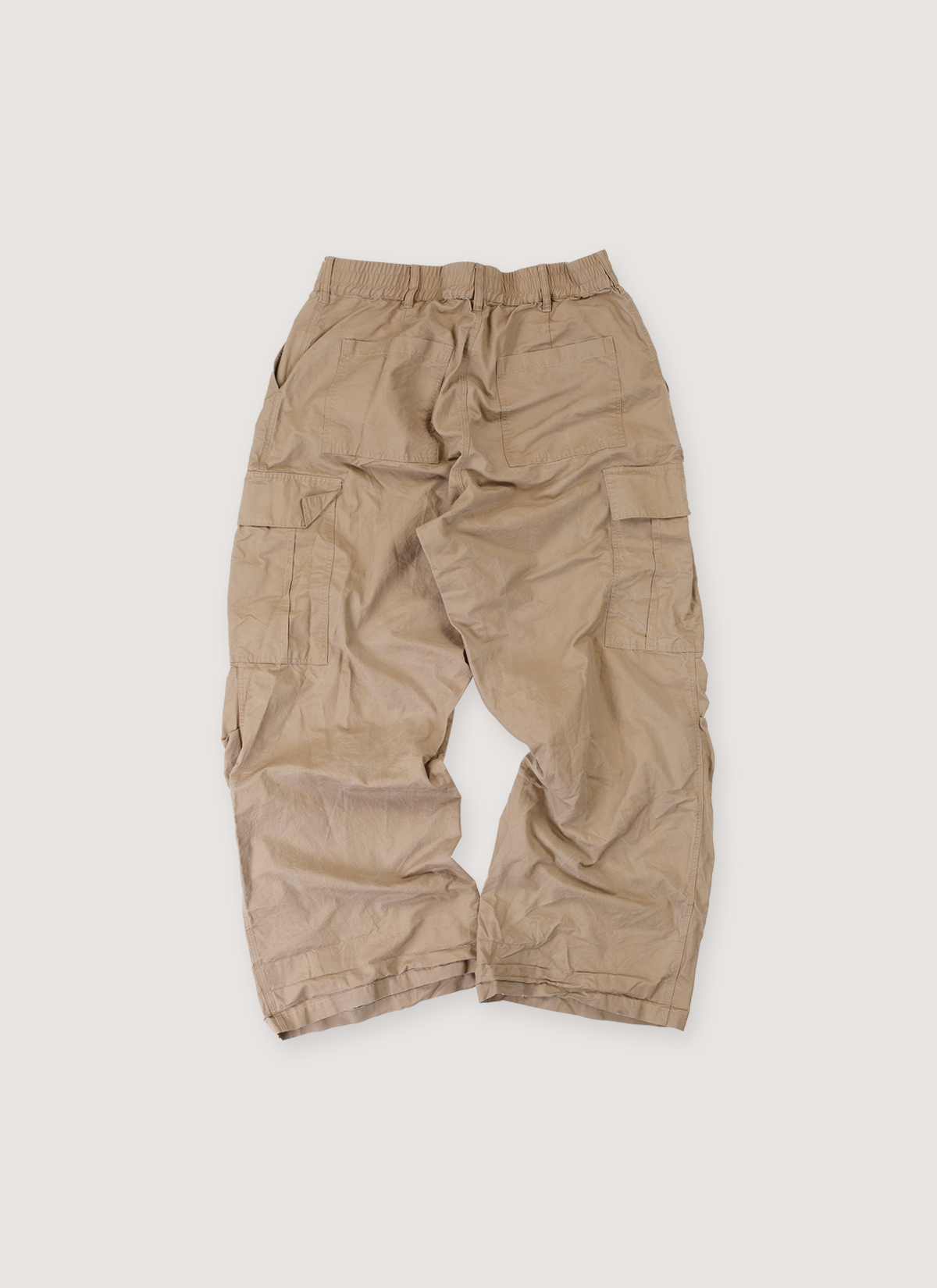 Basketcase Gallery Robin Cargo Pants Tan (Pre-Owned) with cargo pockets, zipper and button closure, elasticated waistband, back view Basketcase Gallery Robin Cargo Pants Tan (Pre-Owned) - Image 2 | Authenticated at Pieces Los Angeles