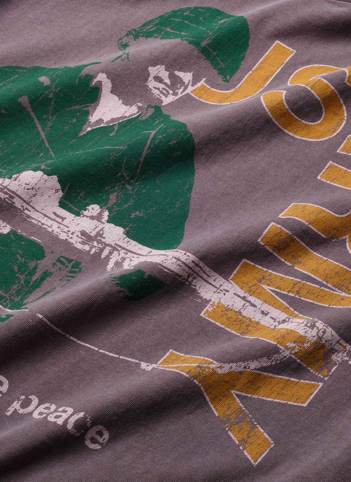 Pieces Rose Garden Tee Shirt Vintage Brown Stone with graphic of green soldier with yellow text, front view, close up of graphic