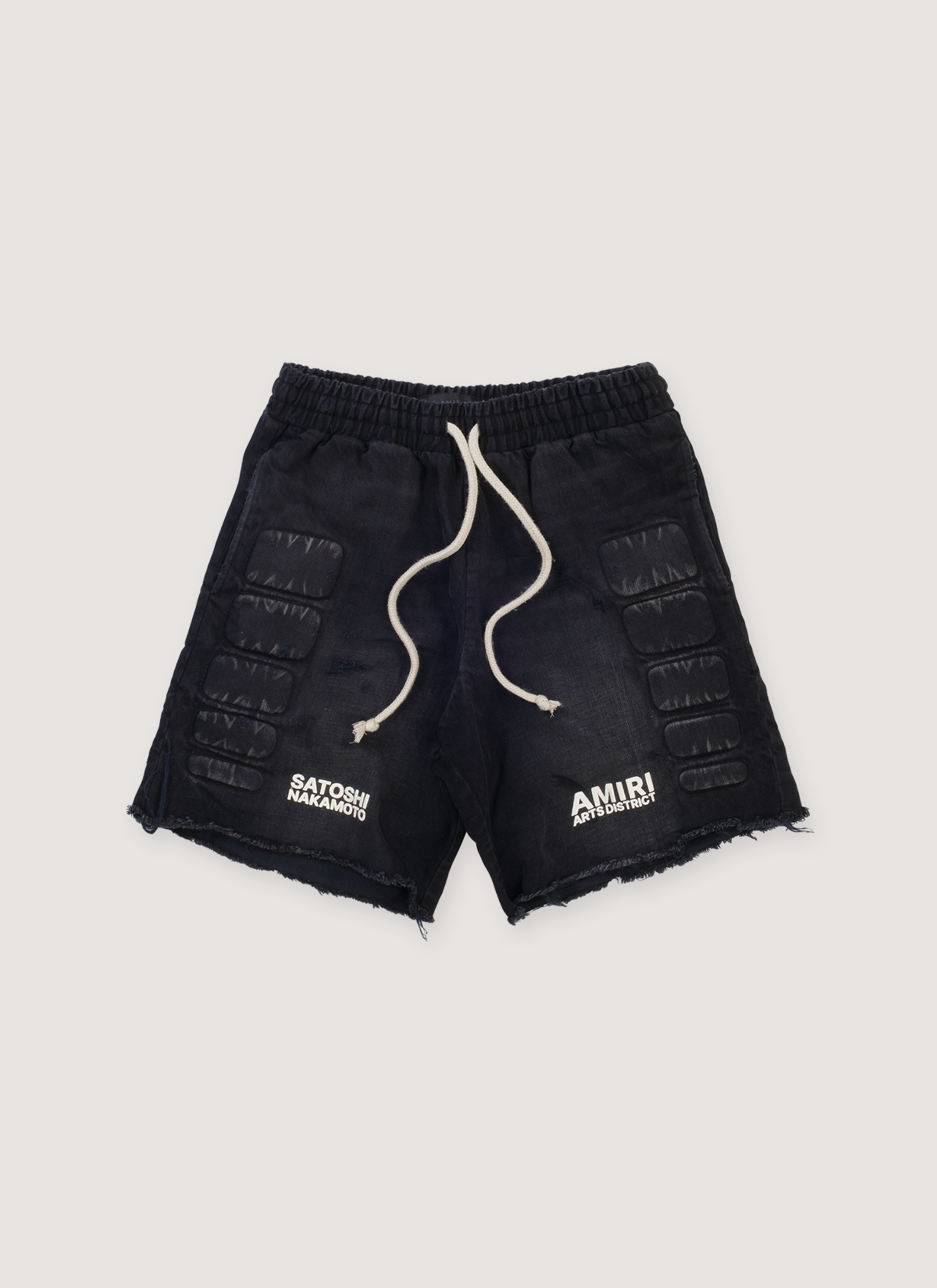 Amiri Satoshi Nakamoto Moto Cotton Denim Shorts Washed Black (Pre-Owned) with 3D moto pads, elasticated waist, puff printed logos, raw edge hem, front view