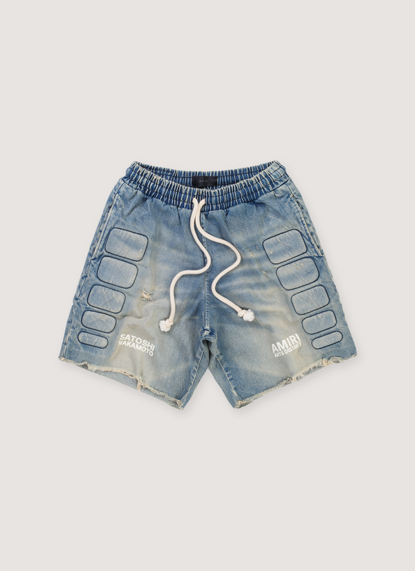 Amiri Satoshi Nakamoto Moto Shorts Indigo Blue Cotton Denim (Pre-Owned) with 3D moto pads, elasticated waist, puff printed logos, raw edge hem, front view Satoshi Nakamoto Moto Shorts Indigo (Pre-Owned) - Authenticated Shorts | Pieces Los Angeles
