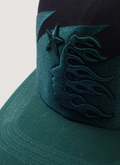 Hellstar Sharktooth Snapback Hat Black Green with embroidered sharktooth pattern, embroidered logos, rhinestone studded underbrim, adjustable back snap closure, close up view of front logo and brim Hellstar Sharktooth Snapback Hat Black Green - Image 3 | Authenticated at Pieces Los Angeles
