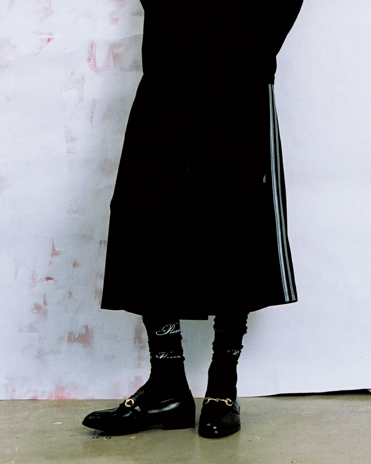Model wearing New Age black shorts — Pieces Los Angeles