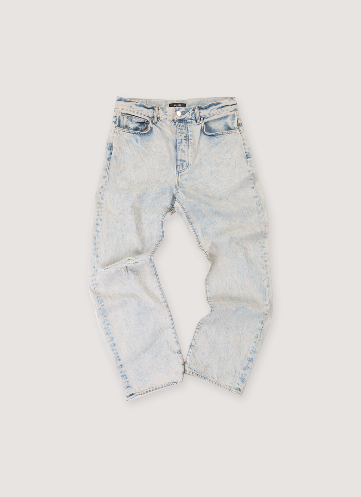 Amiri Shotgun Denim Jeans Acid Wash Cream Tan (Pre-Owned) with reguar rise, straight leg cut, button-zip fly, shotgun distressing, front view
