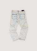 Amiri Shotgun Denim Jeans Acid Wash Cream Tan (Pre-Owned) with reguar rise, straight leg cut, leather logo back tab,, shotgun distressing, two pockets, back view Amiri Shotgun Jeans Acid Wash Cream Tan (Pre-Owned) - Image 2 | Authenticated at Pieces Los Angeles