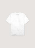 Amiri Core Logo Shotgun Tee White Distressed back view with faded Amiri text Amiri Core Logo Shotgun Tee White - Image 2 | Authenticated at Pieces Los Angeles