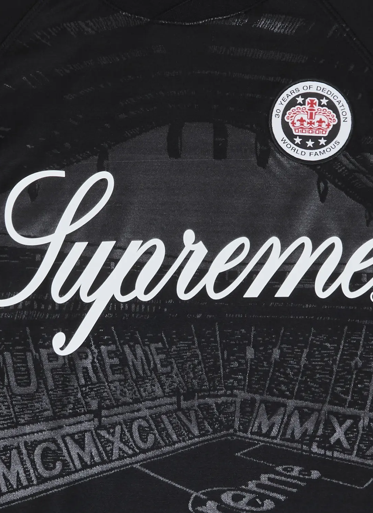 Supreme Jacquard Soccer Jersey tee shirt Black, with woven patch, and embroidered graphic of a stadium that says Supreme, close up view of the stadium and text Supreme Jacquard Soccer Jersey Black - Image 3 | Authenticated at Pieces Los Angeles