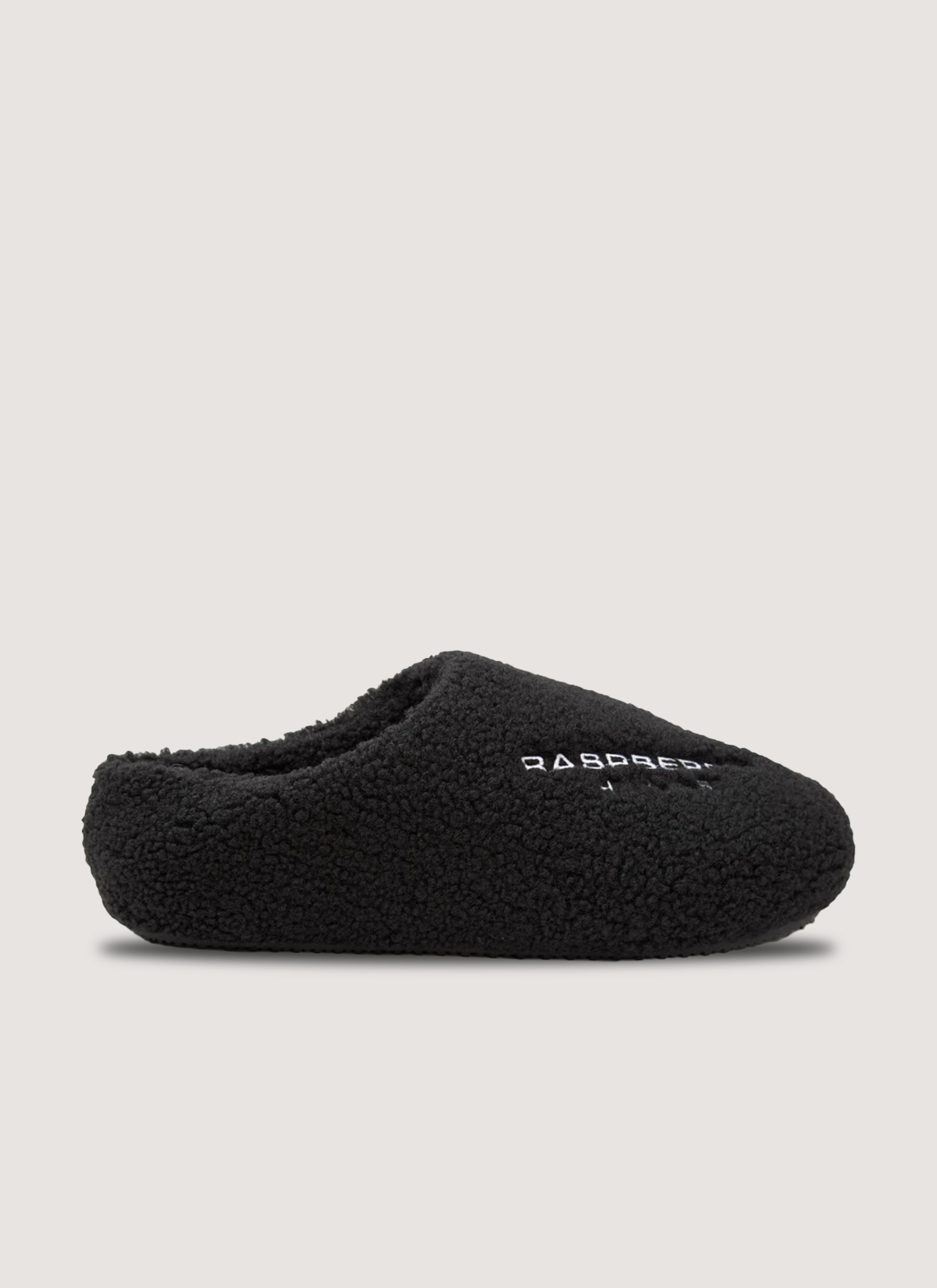 GV Gallery Stacy From The Woods Slips Black slip on slides, plush wool upper, rubber traction sole, embroidered logos, side profile GV Gallery Stacy From The Woods Slips Black - Image 1 | Authenticated at Pieces Los Angeles