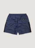 Gallery Dept. Zuma Shorts Pinstripe Navy (Pre-Owned) with side and back pockets, dead-stock military fabric, subtle pinstripe print, raw edge hem, above the knee fit, back view Gallery Dept. Zuma Shorts Pinstripe Navy (Pre-Owned) - Image 2 | Authenticated at Pieces Los Angeles