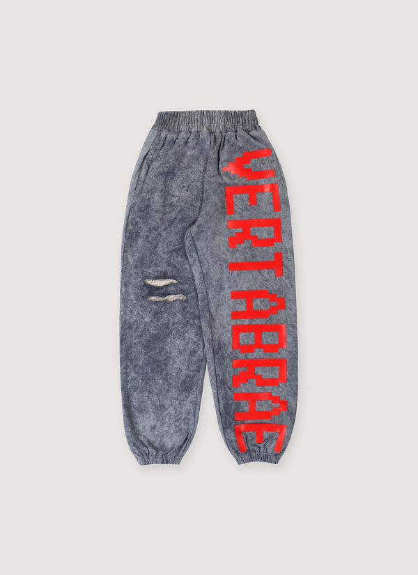 Vertabrae C-1 Sweatpants Washed Grey Red distressed with tears, cuffed, big red graphic text running down one leg, front view C-1 Sweatpants Washed Grey Red - Authenticated Sweatpants | Pieces Los Angeles