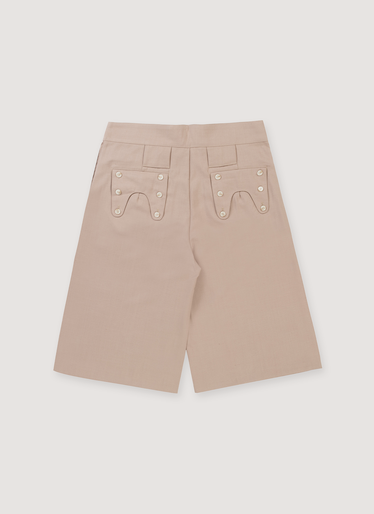 Neaux Doubt Western Arc Pleated Shorts Tan with buttons, back view