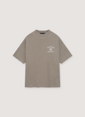 Essentials Jersey Crewneck Tee Shirt Heather Grey with printed logo, rib knit collar, rubberized logo, front view Essentials Jersey Crewneck Tee Heather Grey - Image 1 | Authenticated at Pieces Los Angeles