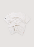 Gallery Dept. Firsthand Tokyo Tee Shirt Cream (Pre-Owned) with printed logos, hand painted details, back view Gallery Dept. Firsthand Tokyo Tee Cream (Pre-Owned) - Image 2 | Authenticated at Pieces Los Angeles