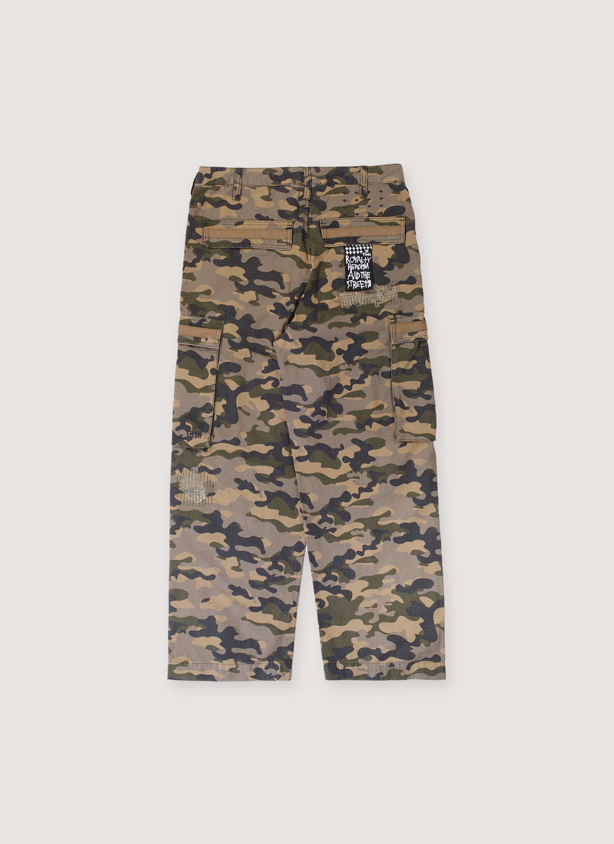 Ksubi Troop Cargo Pants Camo khaki with pockets and repair stitch on the left knee, and a patch on the back pocket, back view Ksubi Troop Cargo Pants Camo - Image 2 | Authenticated at Pieces Los Angeles