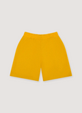 Denim Tears Denim University Mesh Shorts Yellow back view Denim Tears Denim University Mesh Shorts Yellow - Image 2 | Authenticated at Pieces Los Angeles